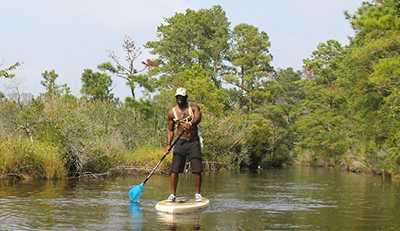 Man Stand up Paddleboarding